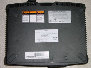 Pela foto o console aparenta não ter sido aberto.